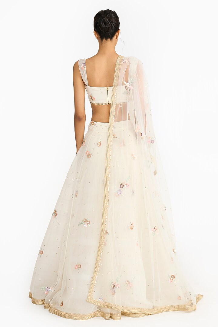Ivory Tulle Embroidered Bridal Lehenga Set by Gauri And Nainika at Pernia's Pop Up Shop