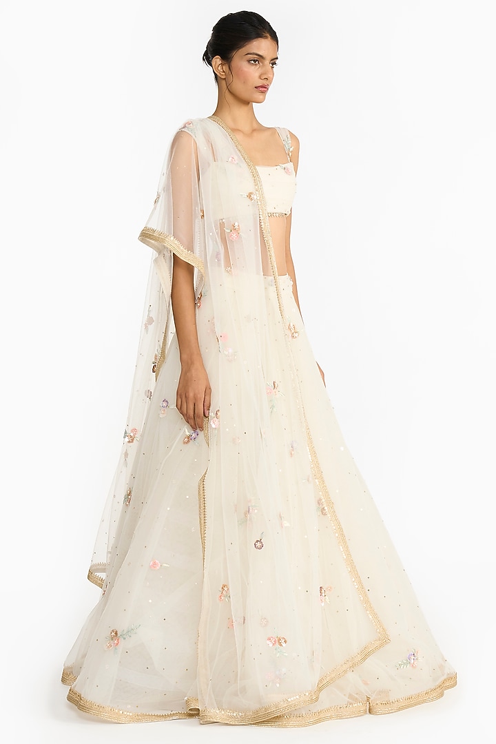 Ivory Tulle Embroidered Bridal Lehenga Set by Gauri And Nainika at Pernia's Pop Up Shop