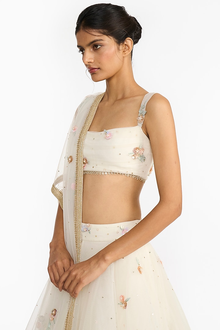 Ivory Tulle Embroidered Bridal Lehenga Set by Gauri And Nainika at Pernia's Pop Up Shop