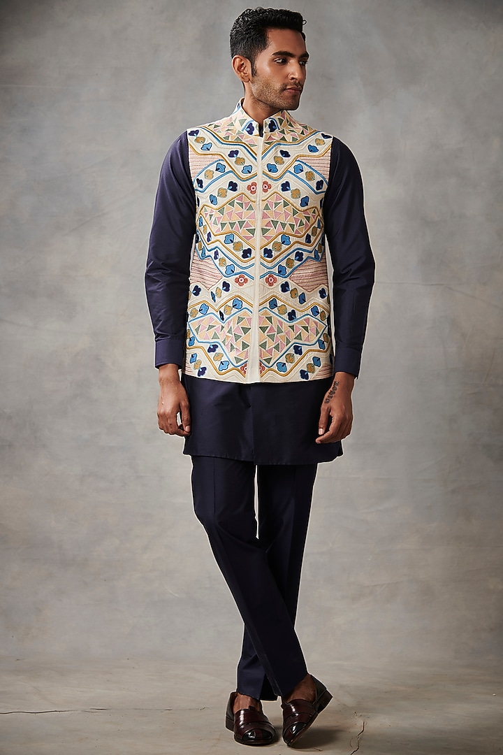 White Slub Silk Machine Embroidered Bundi Jacket Set by Gargee Designers at Pernia's Pop Up Shop