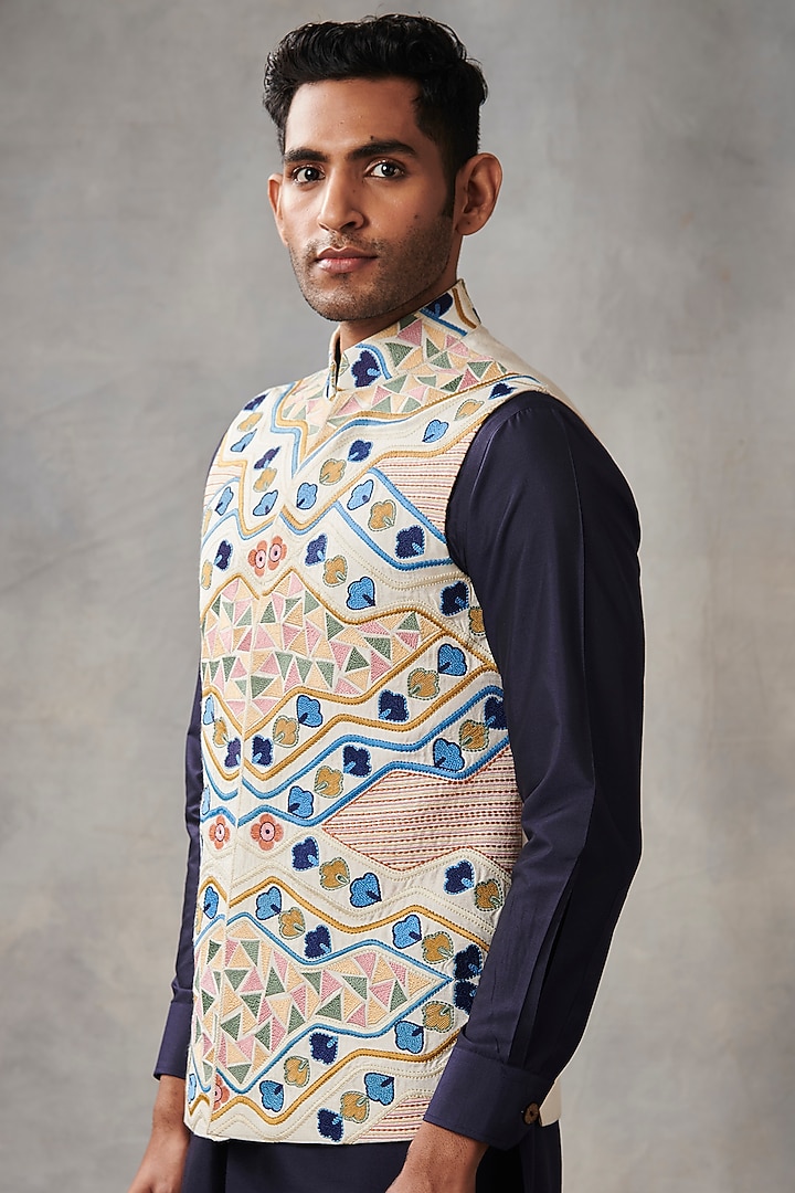 White Slub Silk Machine Embroidered Bundi Jacket Set by Gargee Designers at Pernia's Pop Up Shop