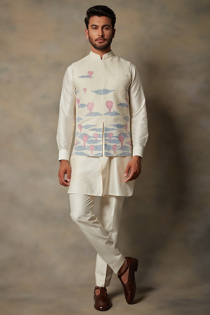White Silk Embellished Bundi Jacket With Kurta Set by Gargee Designers