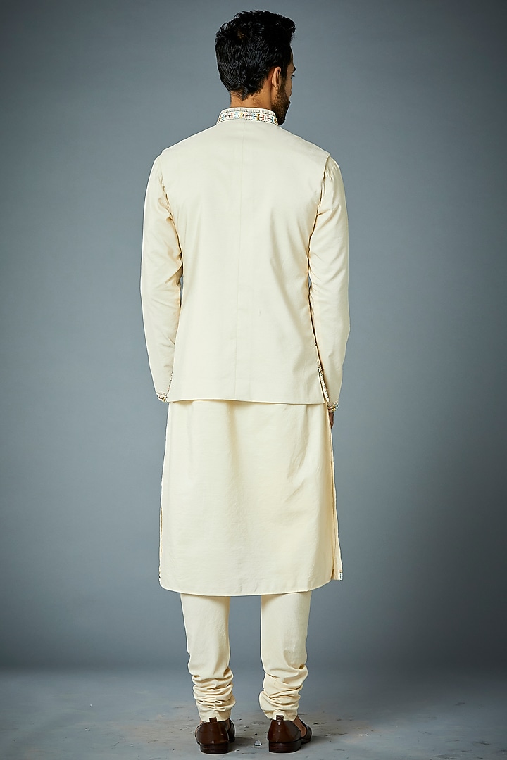 Ivory Cotton Silk Floral Machine Embroidered Bundi Jacket Set by Gargee Designers at Pernia's Pop Up Shop