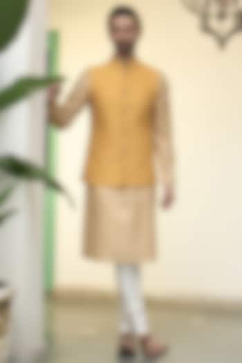 Mustard Cotton Silk Quilted Bundi Jacket Set by Gargee Designers