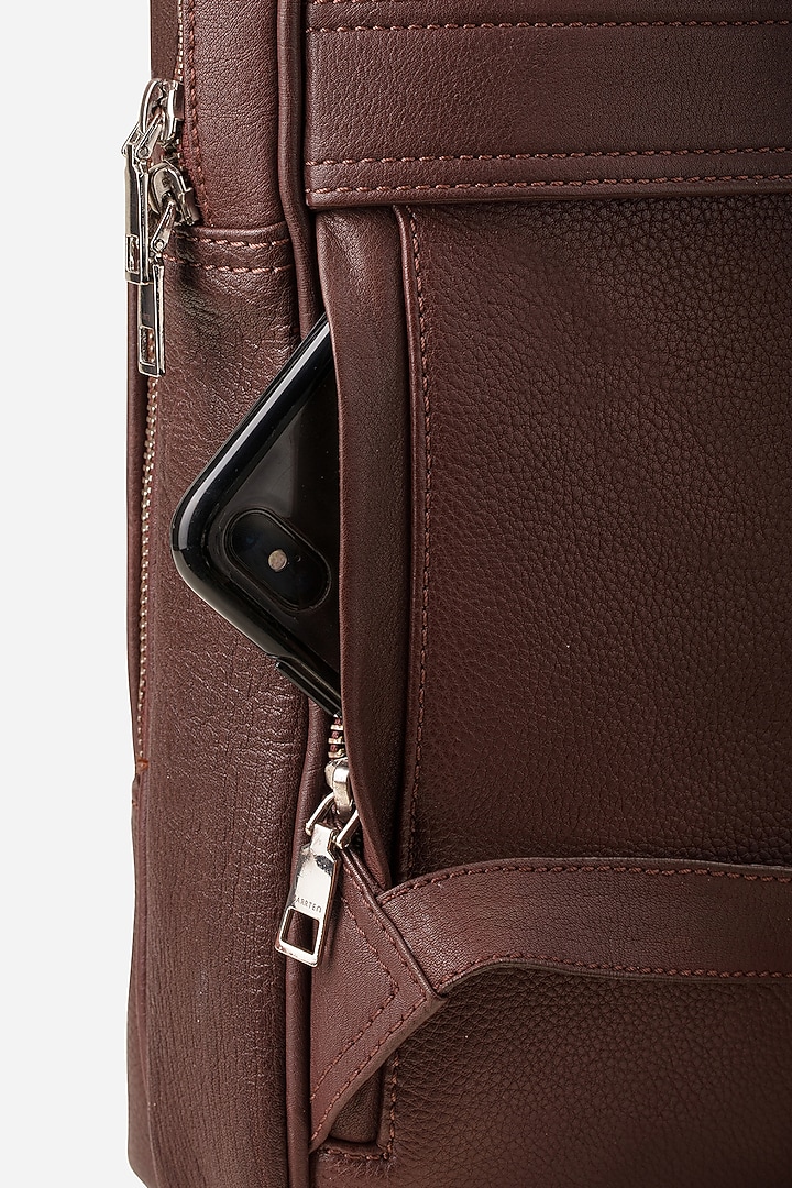 Mahogany Brown Leather Backpack by GARRTEN at Pernia's Pop Up Shop