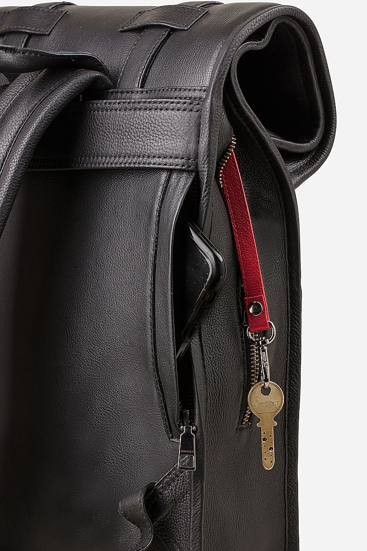 Carbon Black Leather Rolltop Backpack by GARRTEN at Pernia's Pop Up Shop