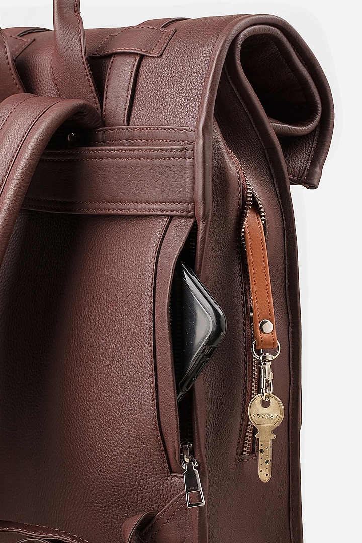 Mahogany Brown Leather Rolltop Backpack by GARRTEN at Pernia's Pop Up Shop