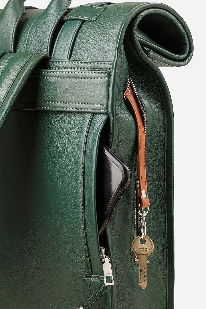 Racing Green Leather Rolltop Backpack by GARRTEN at Pernia's Pop Up Shop