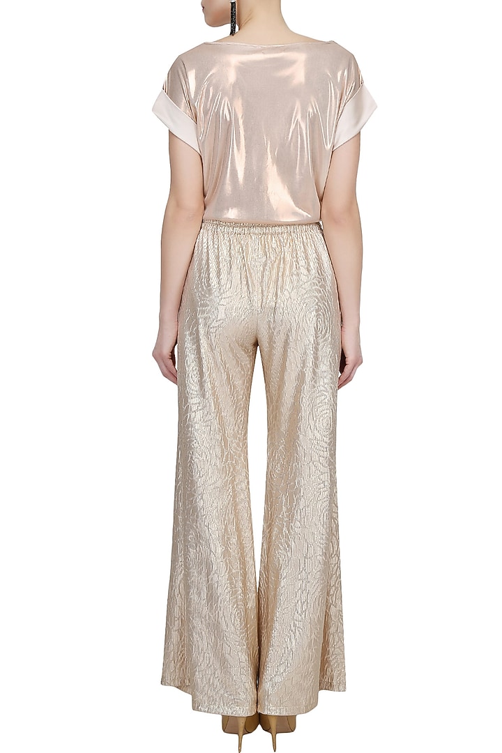 Light gold self rose printed flared palazzo pants available only at Pernia's Pop Up Shop.