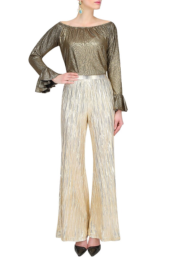 Gold knitted flared palazzo pants available only at Pernia's Pop Up Shop.