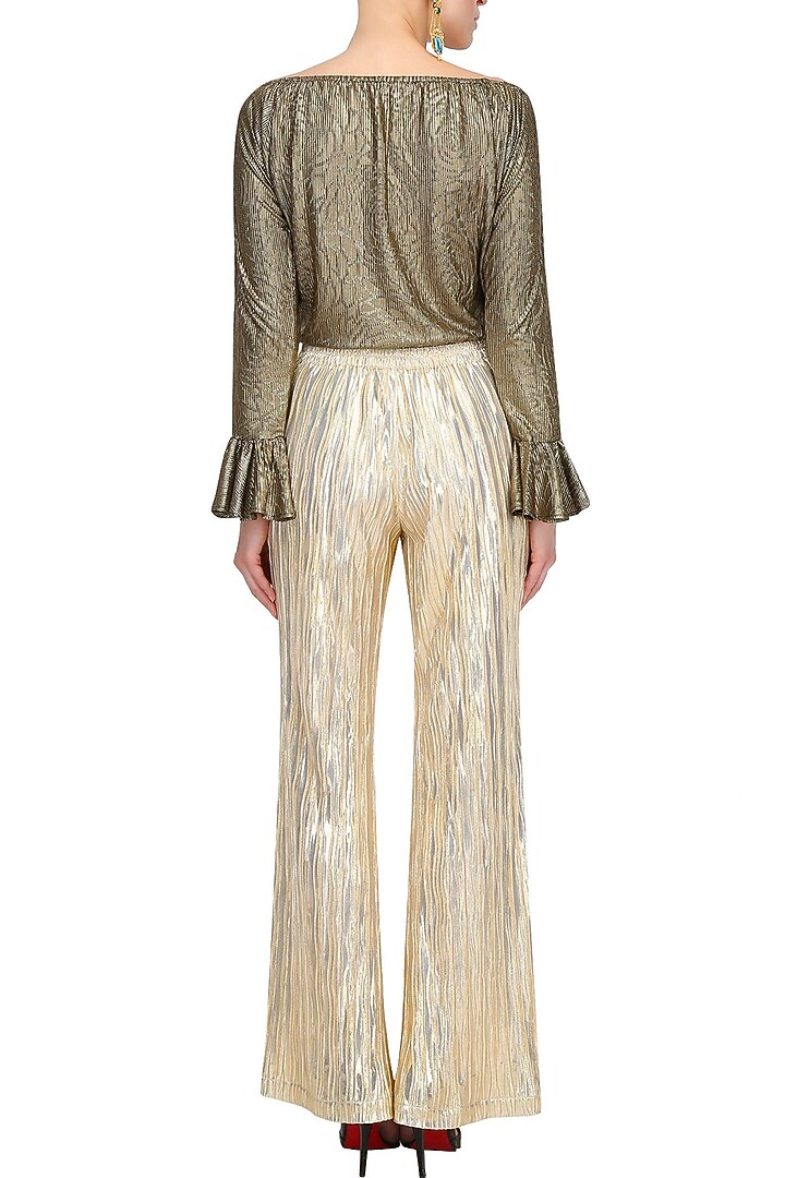 Gold knitted flared palazzo pants available only at Pernia's Pop Up Shop.