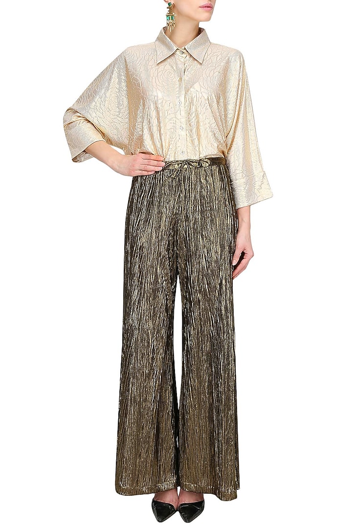 Black and gold crushed flared palazzo pants available only at Pernia's Pop  Up