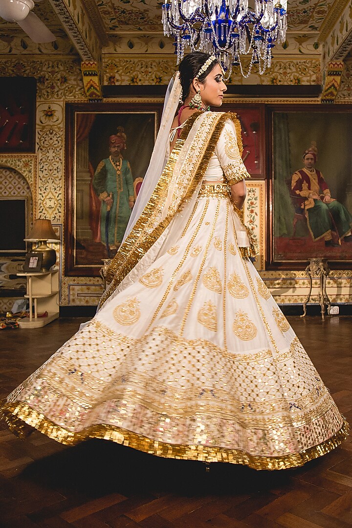 Ivory Muslin Embroidered Handcrafted Bridal Lehenga Set by GulaboJaipur by Saloni Panwar at Pernia's Pop Up Shop