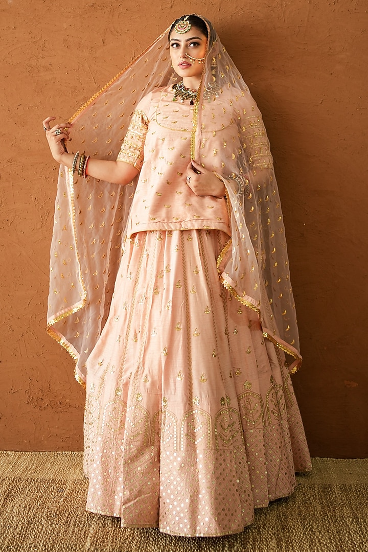 Peach Raw Silk Marodi Embroidered Wedding Lehenga Set by GulaboJaipur by Saloni Panwar at Pernia's Pop Up Shop