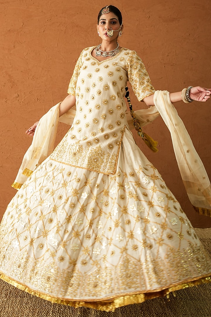 Ivory Raw Silk Marodi Embroidered Bridal Lehenga Set by GulaboJaipur by Saloni Panwar at Pernia's Pop Up Shop