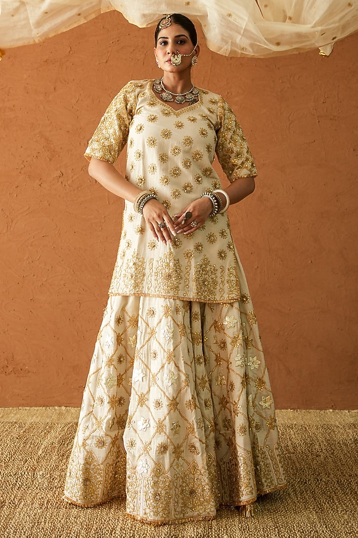 Ivory Raw Silk Marodi Embroidered Bridal Lehenga Set by GulaboJaipur by Saloni Panwar at Pernia's Pop Up Shop