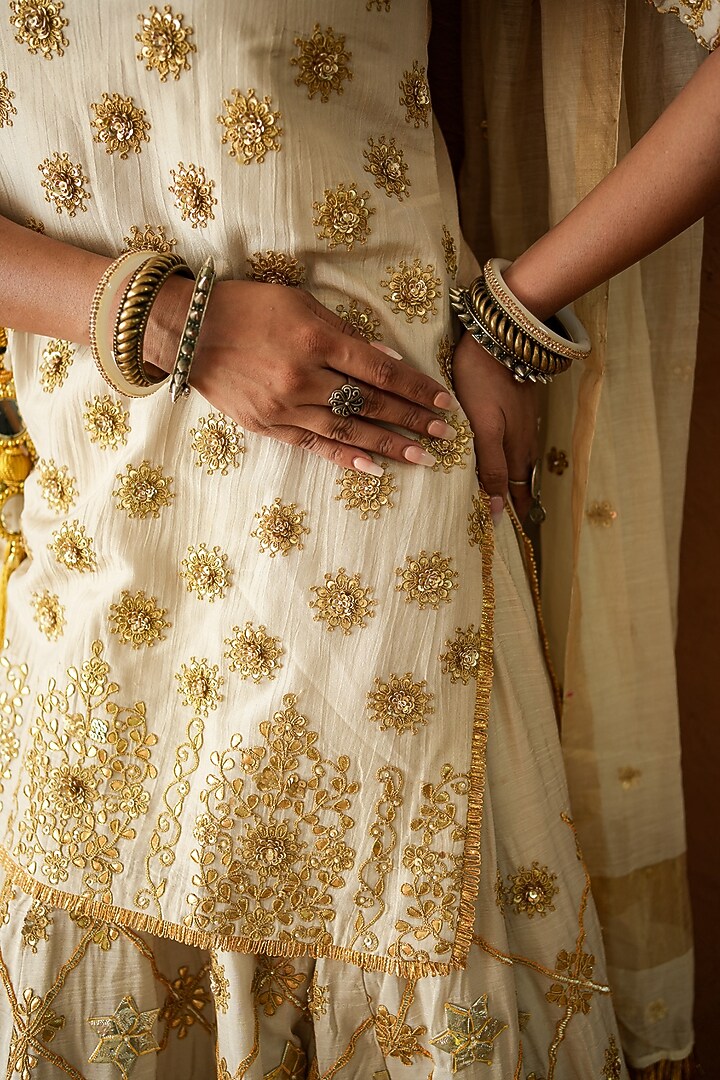 Ivory Raw Silk Marodi Embroidered Bridal Lehenga Set by GulaboJaipur by Saloni Panwar at Pernia's Pop Up Shop