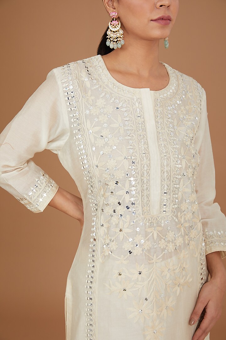 White Chanderi & Cotton Mirror Embroidered Kurta Set by GENDAPHOOL at Pernia's Pop Up Shop