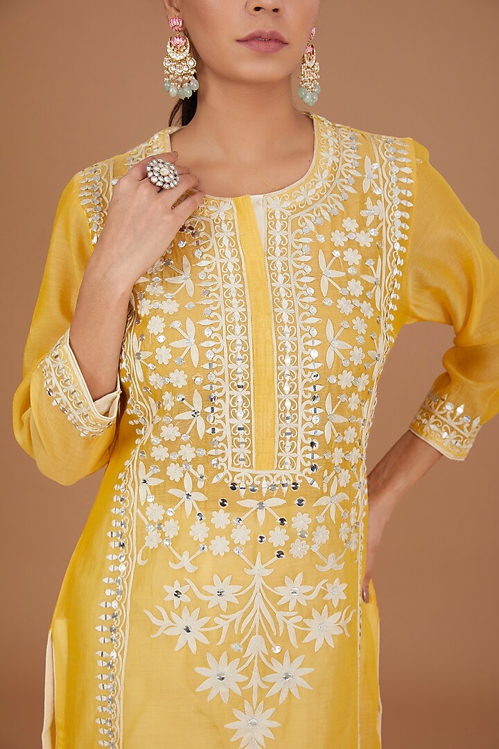 Yellow Chanderi & Cotton Mirror Embroidered Kurta Set by GENDAPHOOL at Pernia's Pop Up Shop