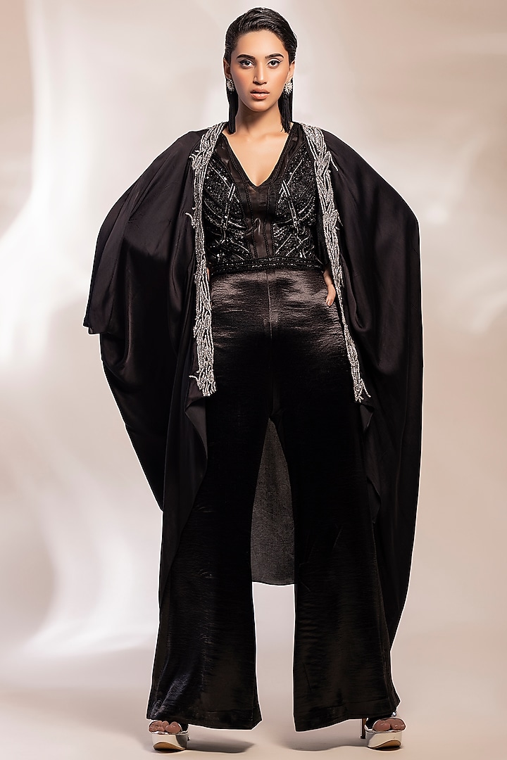 Black Satin Sequins Embroidery Jumpsuit With Cape by GEE SIN by Geetanjali Singh