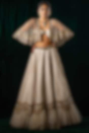 Ivory Embroidered Wedding Lehenga & Cape Set by Geethika Kanumilli at Pernia's Pop Up Shop