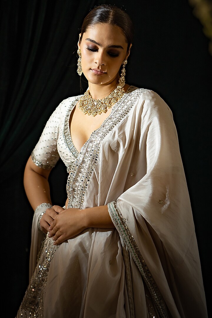 Ivory Raw Silk Embroidered Bridal Lehenga Set by Geethika Kanumilli at Pernia's Pop Up Shop