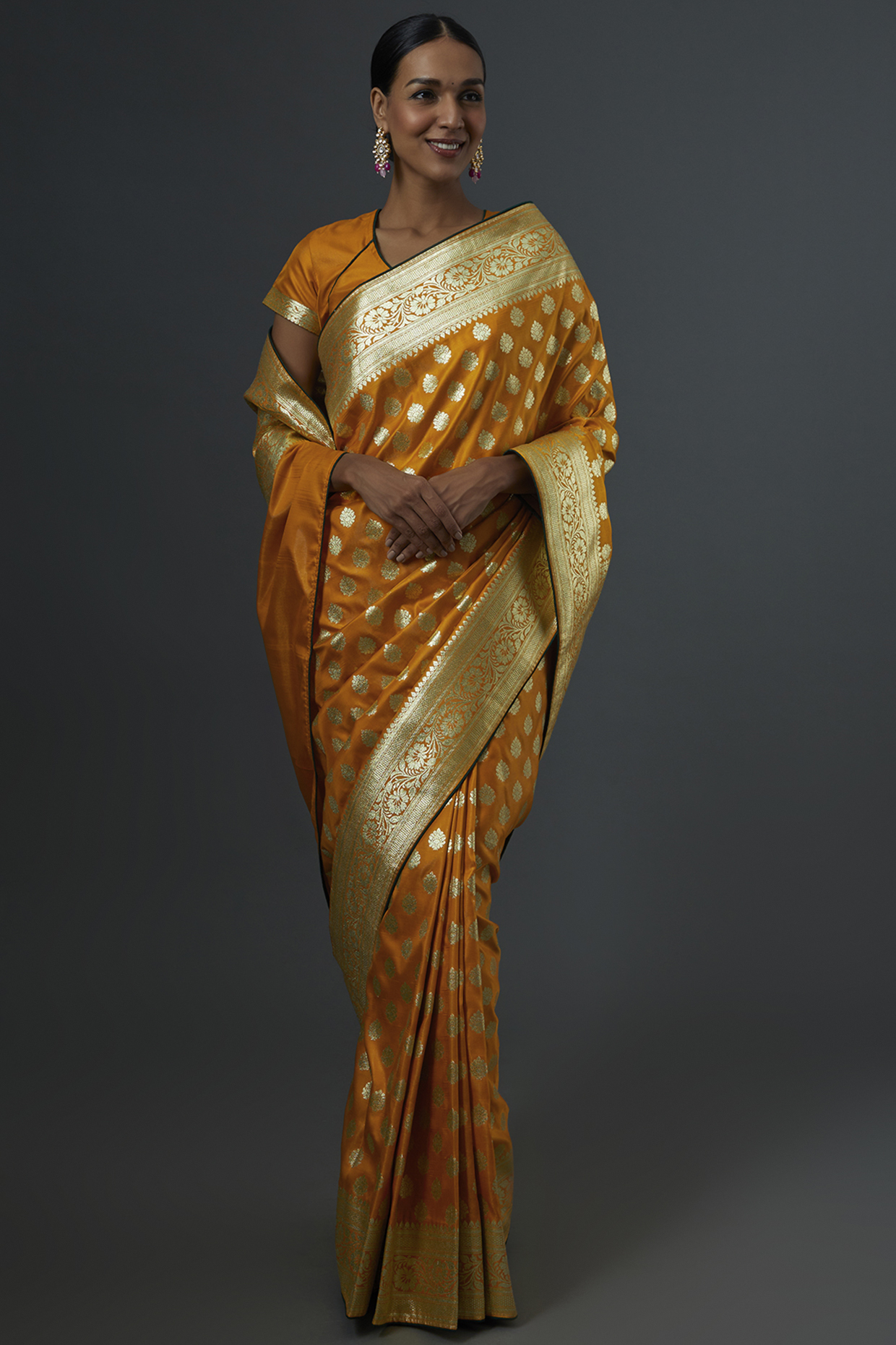 Turmeric Yellow & Gold Silk Saree Set by Label GehnaSamah