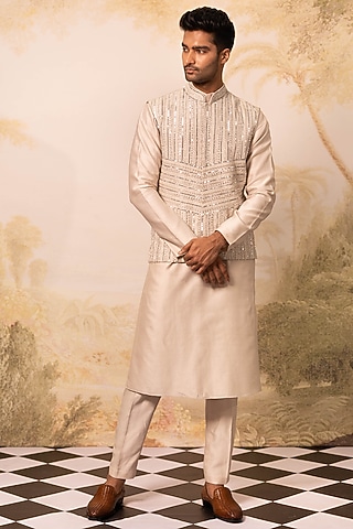 Ivory Chanderi & Raw Silk Bundi Jacket Set by Geethika Kanumilli Men