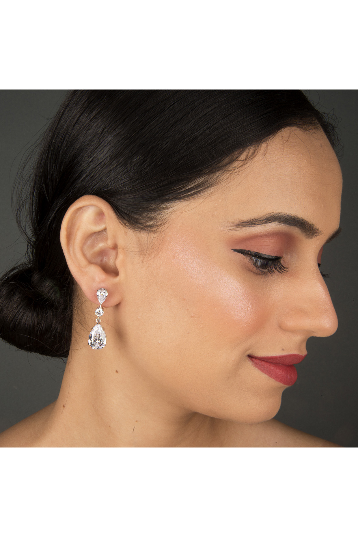 White Finish Pear Shape Earrings In Sterling Silver by Gemstruck at Pernia's Pop Up Shop