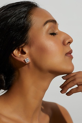 White Finish Zircon Stud Earrings In Sterling Silver by Gemstruck