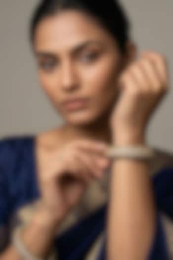 Rose Gold Finish Kundan Polki & Emerald Stone Bangles (Set Of 2) by Gehna Shop at Pernia's Pop Up Shop