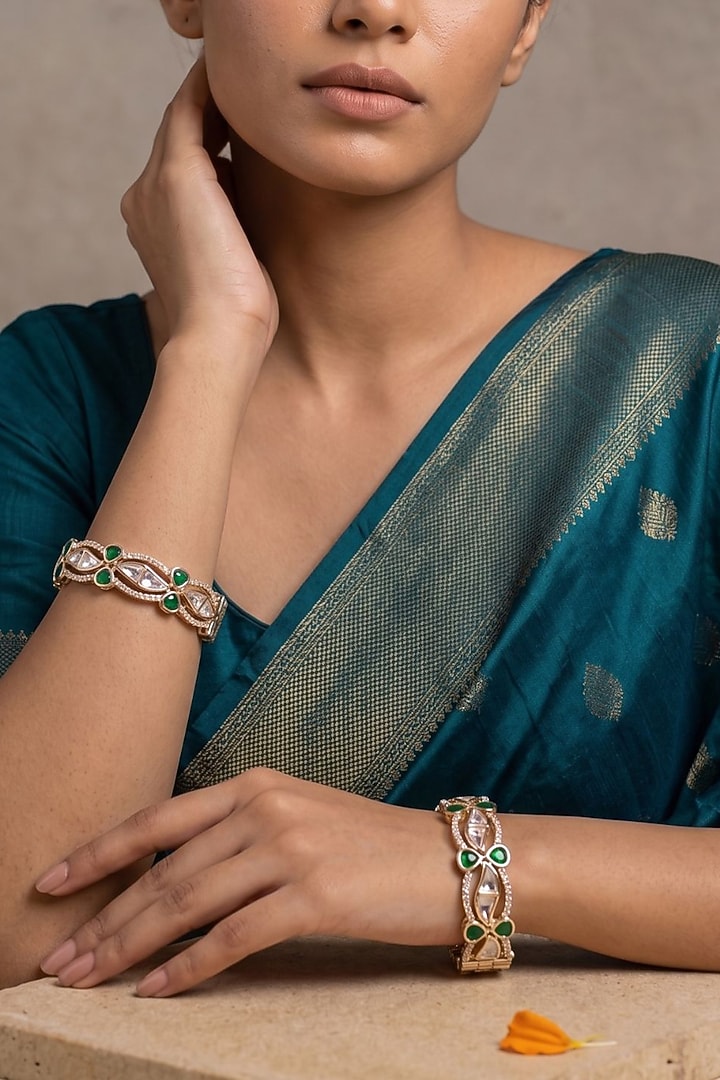 Gold Finish Green Kundan Polki Bangles (Set Of 2) by Gehna Shop at Pernia's Pop Up Shop