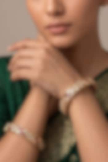 Gold Finish Red Kundan Polki Bangles (Set Of 2) by Gehna Shop at Pernia's Pop Up Shop