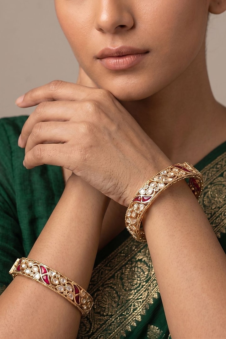Gold Finish Red Kundan Polki Bangles (Set Of 2) by Gehna Shop at Pernia's Pop Up Shop