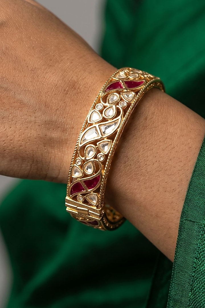 Gold Finish Red Kundan Polki Bangles (Set Of 2) by Gehna Shop at Pernia's Pop Up Shop