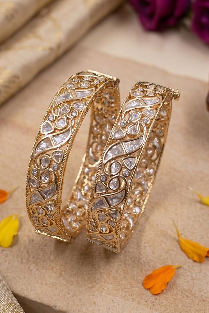 Gold Finish Red Kundan Polki Bangles (Set Of 2) by Gehna Shop at Pernia's Pop Up Shop