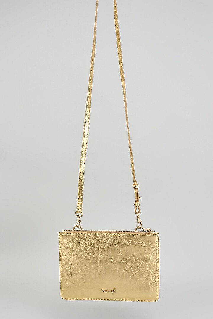Gold Leather Flapover Cross Body Bag by GLA Accessories at Pernia's Pop Up Shop