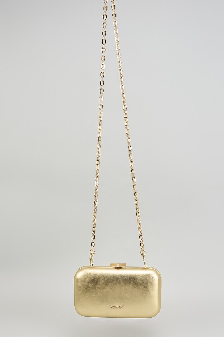 Gold Leather Flapover Cross Body Bag by GLA Accessories at Pernia's Pop Up Shop