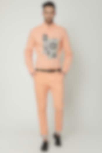 Salmon Pink Chino Trousers by Genes Lecoanet Hemant Men