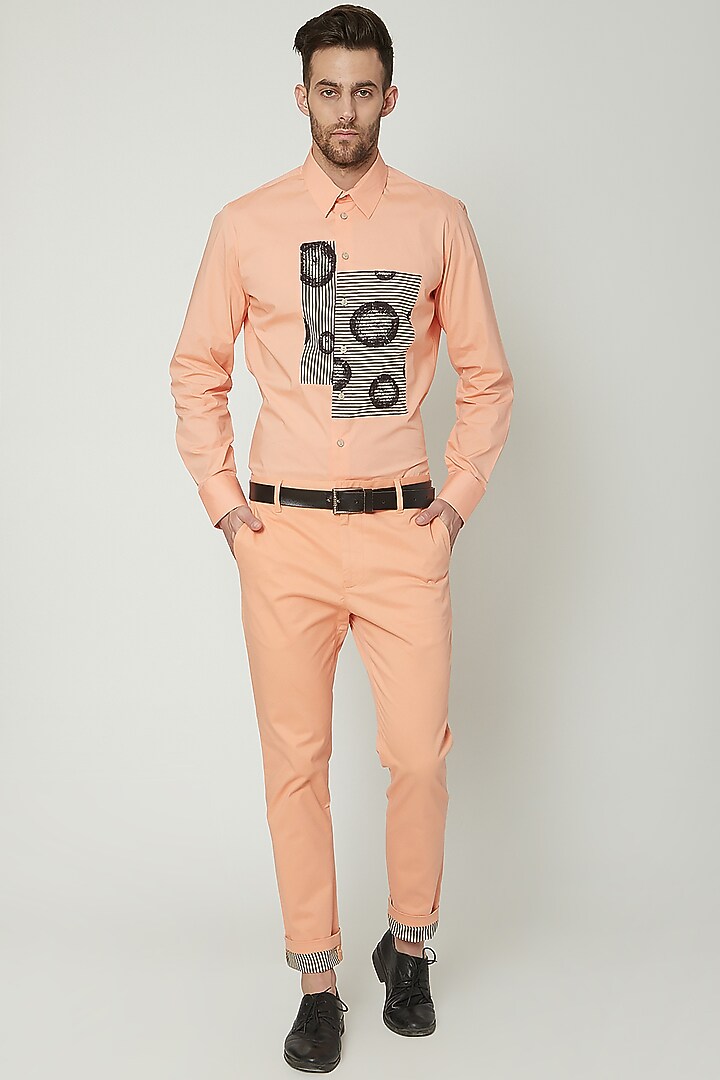 Salmon Pink Chino Trousers by Genes Lecoanet Hemant Men at Pernia's Pop Up Shop