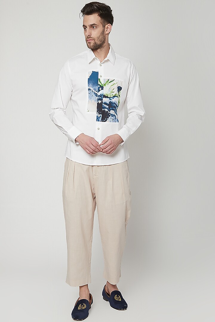 Natural Beige Pleated Trousers by Genes Lecoanet Hemant Men at Pernia's Pop Up Shop