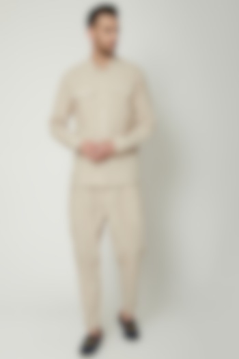 Beige Cotton Trousers by Genes Lecoanet Hemant Men at Pernia's Pop Up Shop