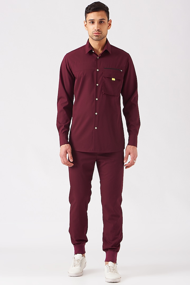 Burgundy Poly Viscose Trousers by Genes Lecoanet Hemant Men at Pernia's Pop Up Shop