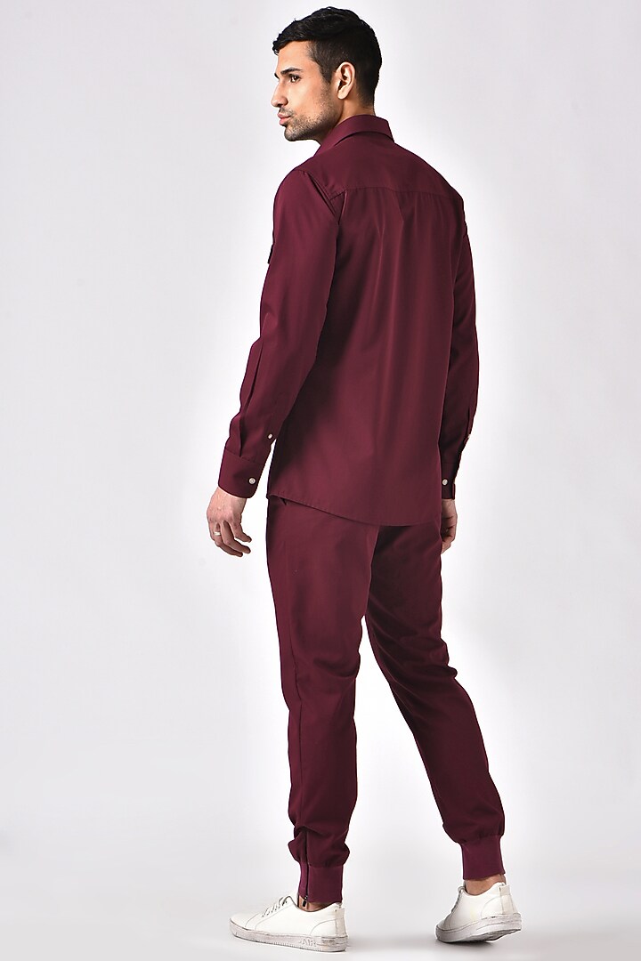 Burgundy Poly Viscose Trousers by Genes Lecoanet Hemant Men at Pernia's Pop Up Shop