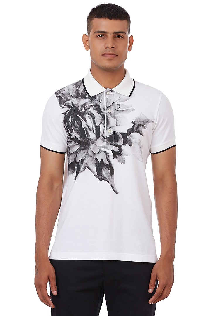 Black & White Floral Printed Polo T-Shirt by Genes Lecoanet Hemant at Pernia's Pop Up Shop