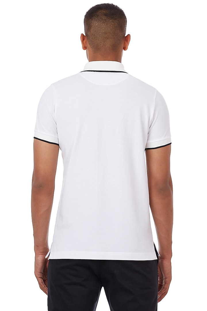 Black & White Floral Printed Polo T-Shirt by Genes Lecoanet Hemant at Pernia's Pop Up Shop