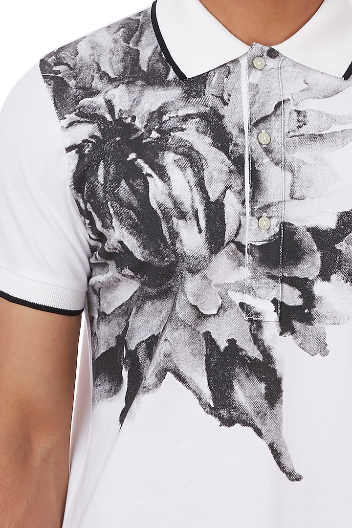 Black & White Floral Printed Polo T-Shirt by Genes Lecoanet Hemant at Pernia's Pop Up Shop