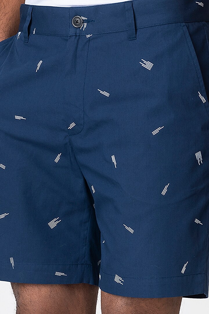 Marine Blue Logo Printed Shorts by Genes Lecoanet Hemant Men at Pernia's Pop Up Shop
