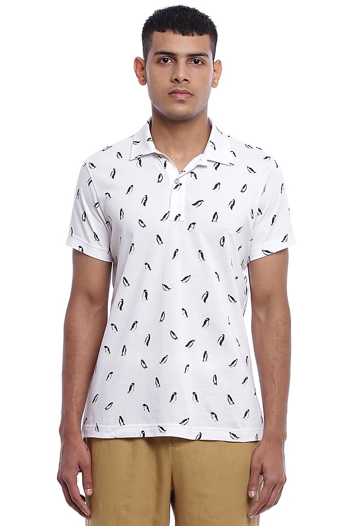 White Printed Polo T-Shirt by Genes Lecoanet Hemant Men at Pernia's Pop Up Shop