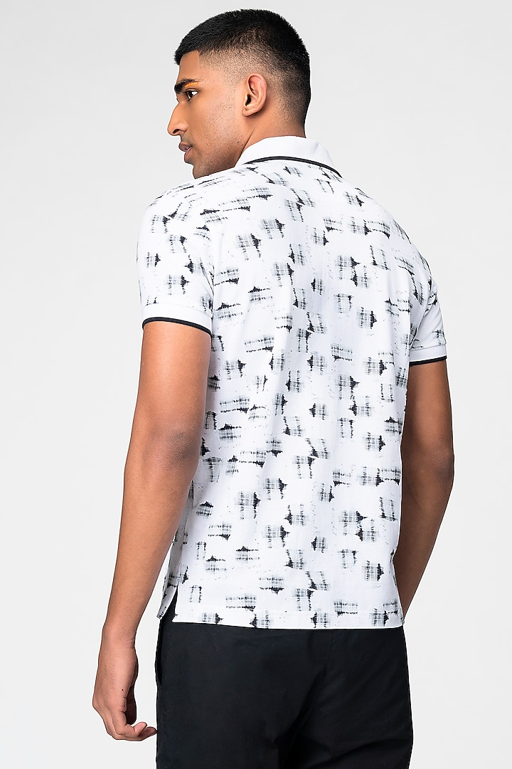 Black & White Checkered Polo T-Shirt by Genes Lecoanet Hemant Men at Pernia's Pop Up Shop